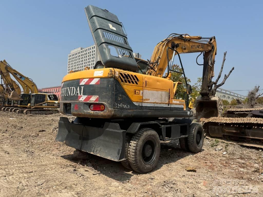 Hyundai R150W-9 حفارات بعجل