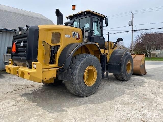 CAT 966 M لوادر بعجل