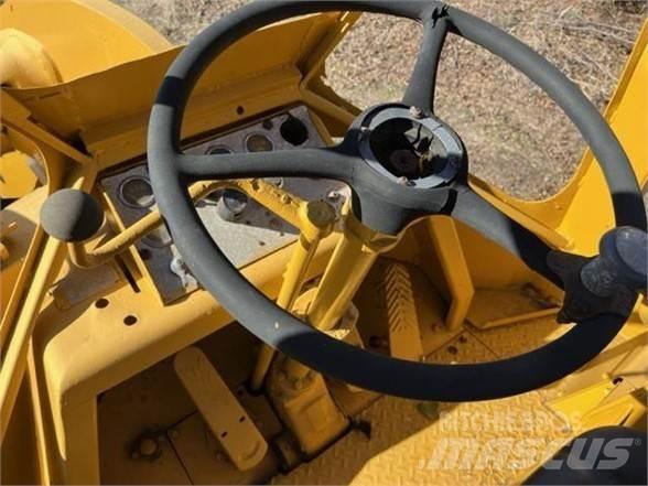 CAT 950 لوادر بعجل