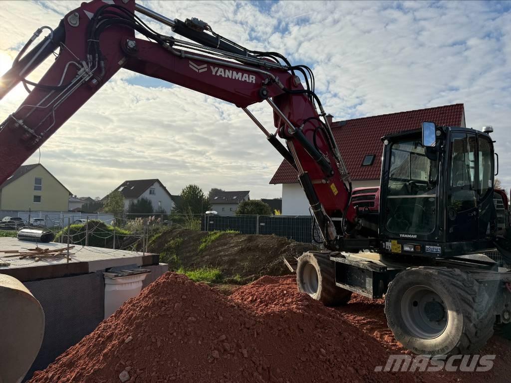 Yanmar B 110 W حفارات بعجل