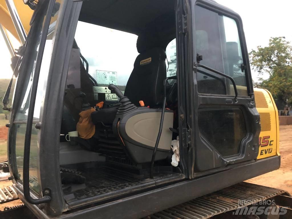 New Holland E 145 حفارات زحافة