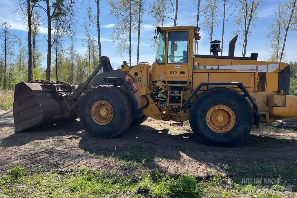 Volvo L 220 لوادر بعجل