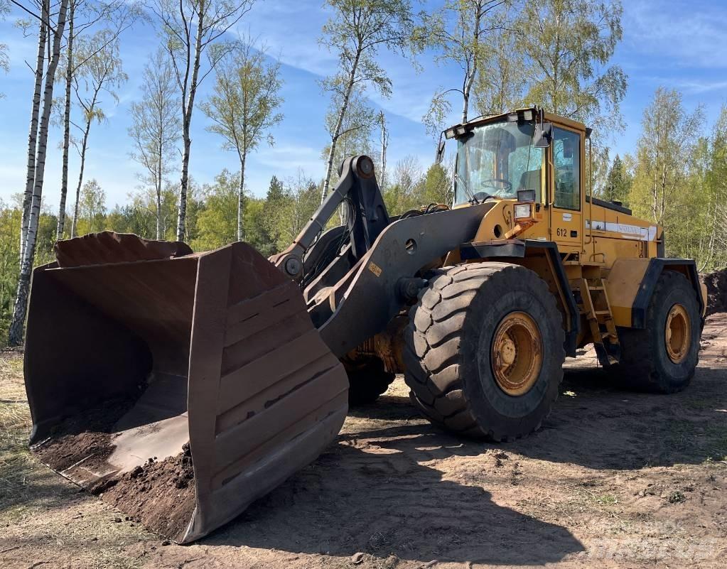 Volvo L 220 لوادر بعجل