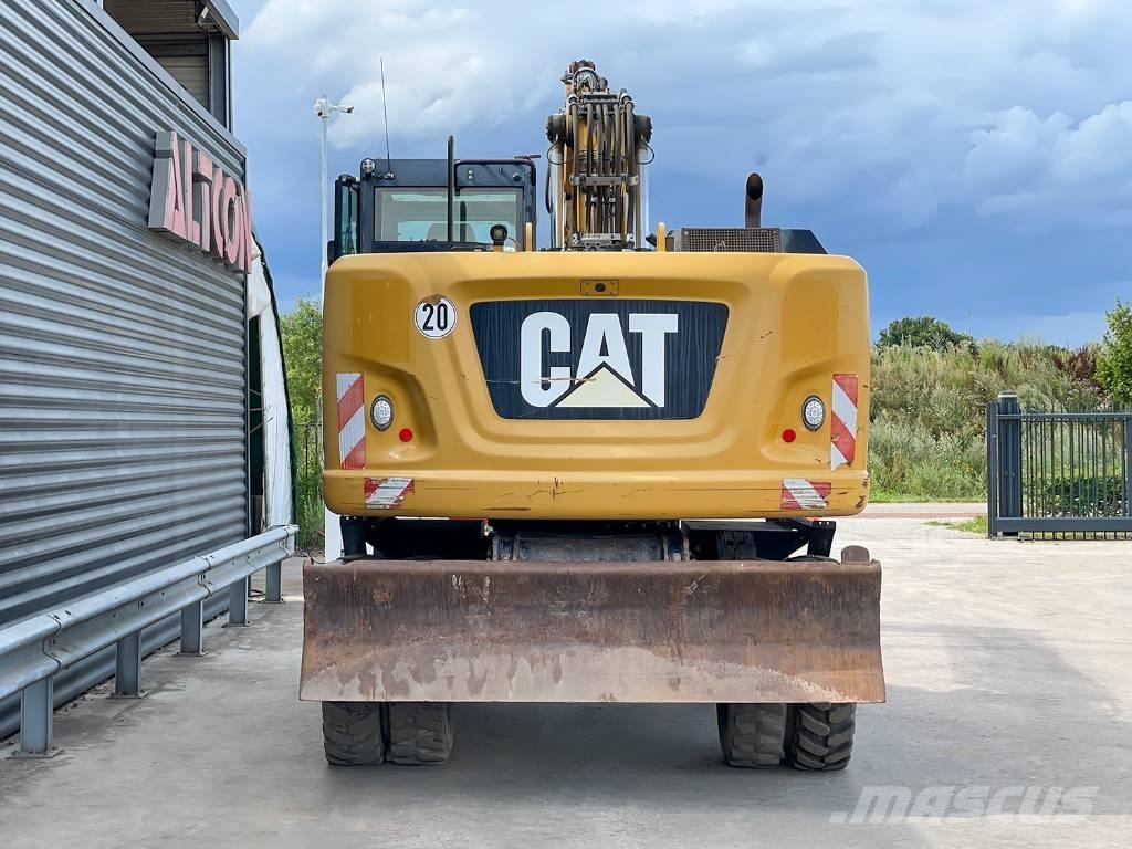 CAT M318F حفارات بعجل