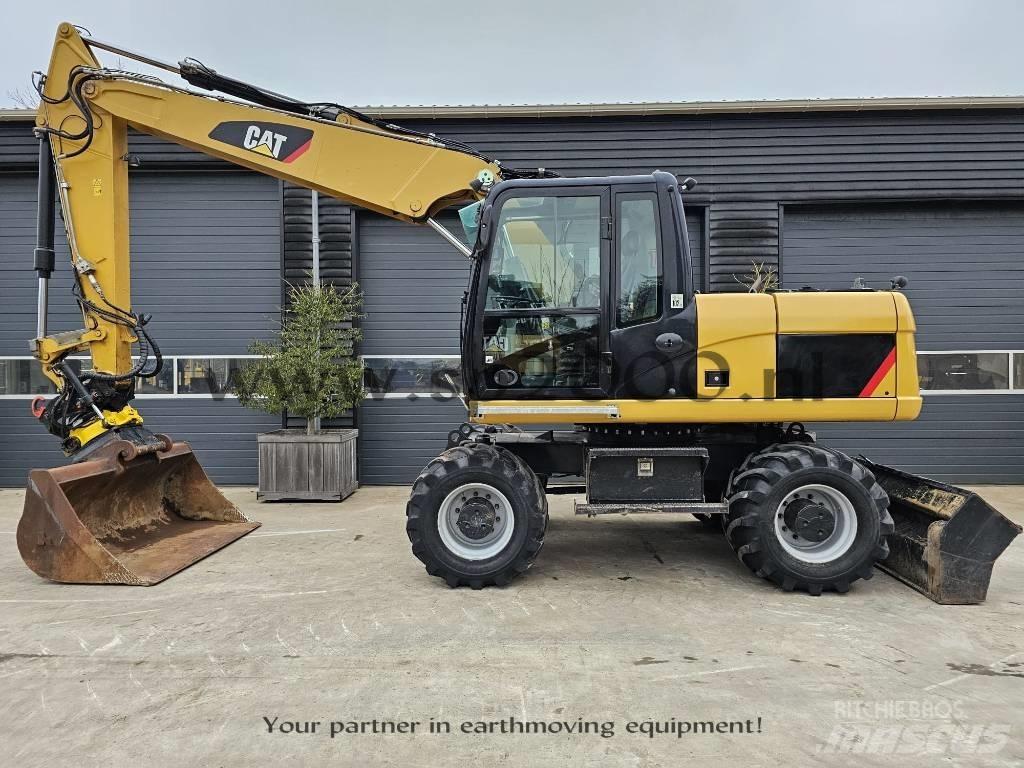CAT M 315 D حفارات بعجل