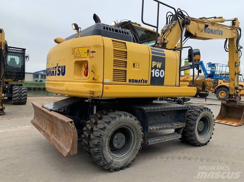 Komatsu PW160-8 حفارات بعجل