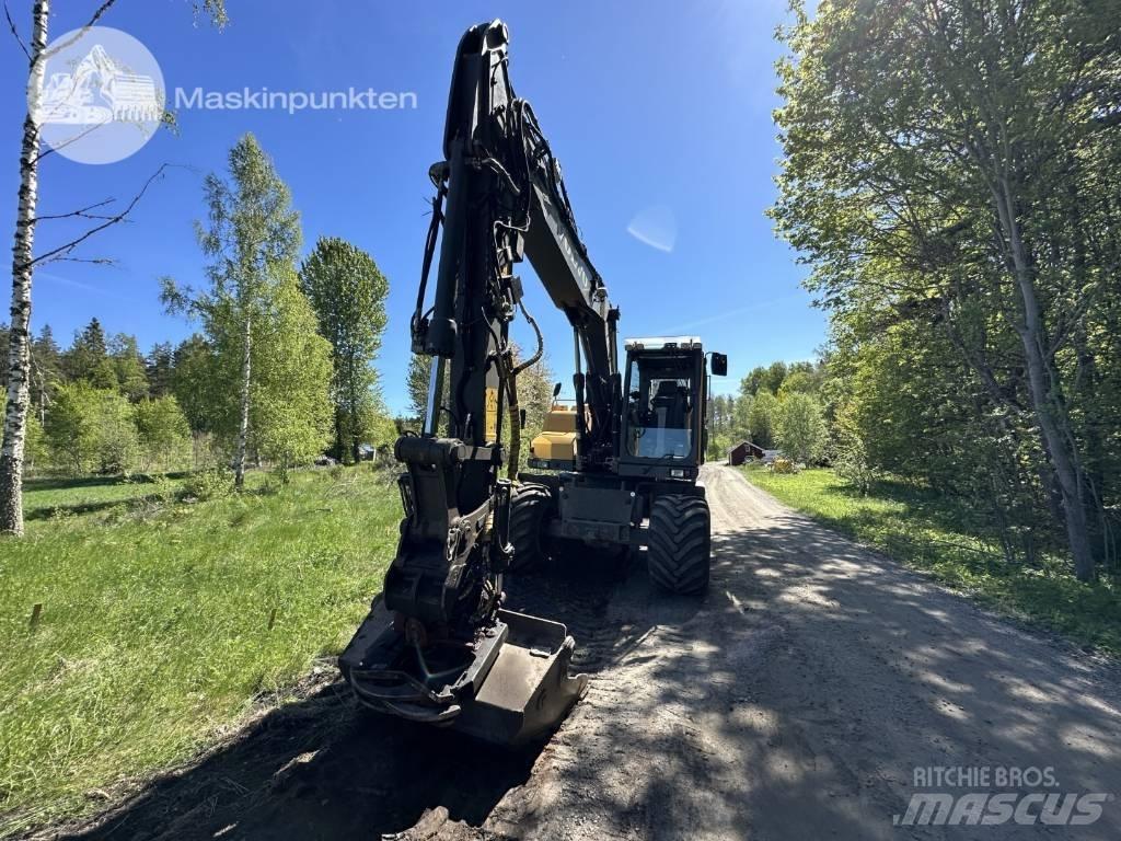 Volvo EW 140 D حفارات بعجل