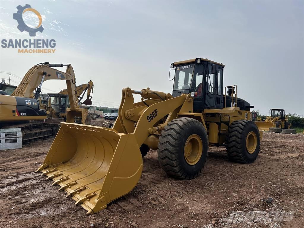 CAT 966F لوادر بعجل