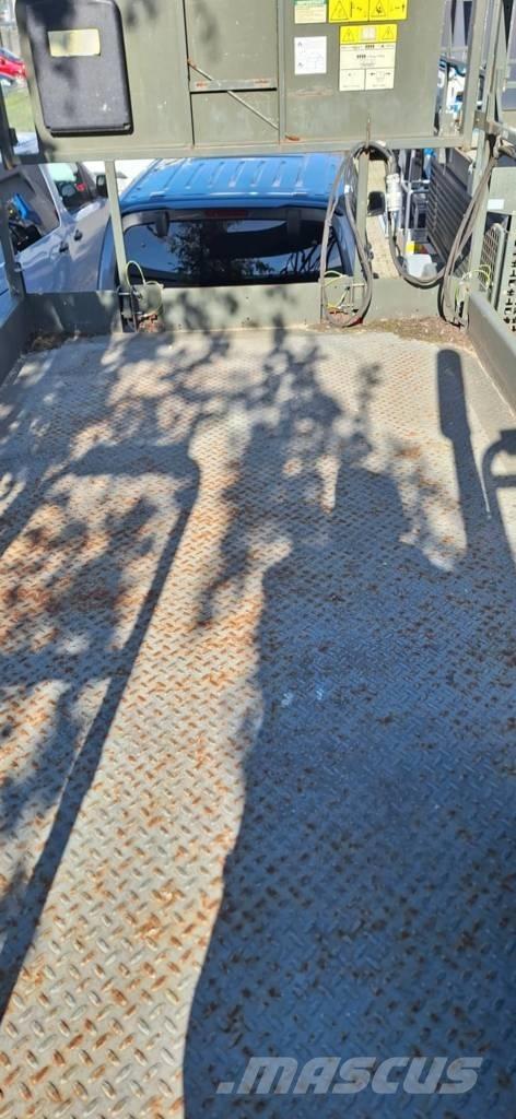 JLG M 3369 رافعات مقصية الشكل