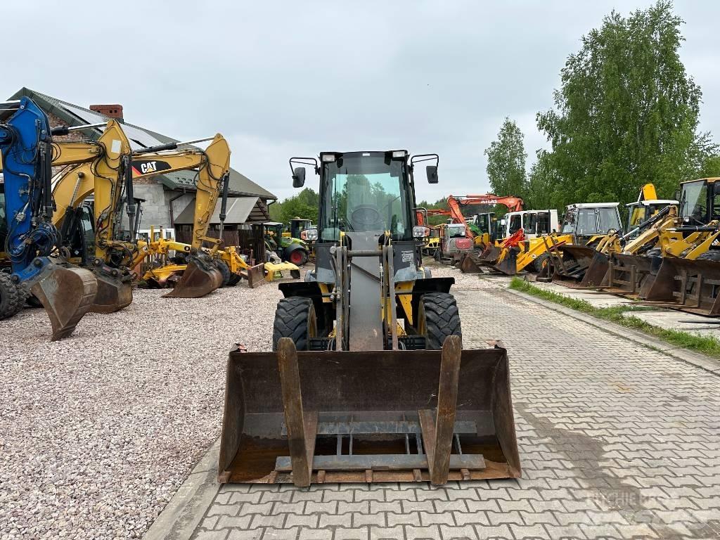 New Holland W 70 TC لوادر بعجل