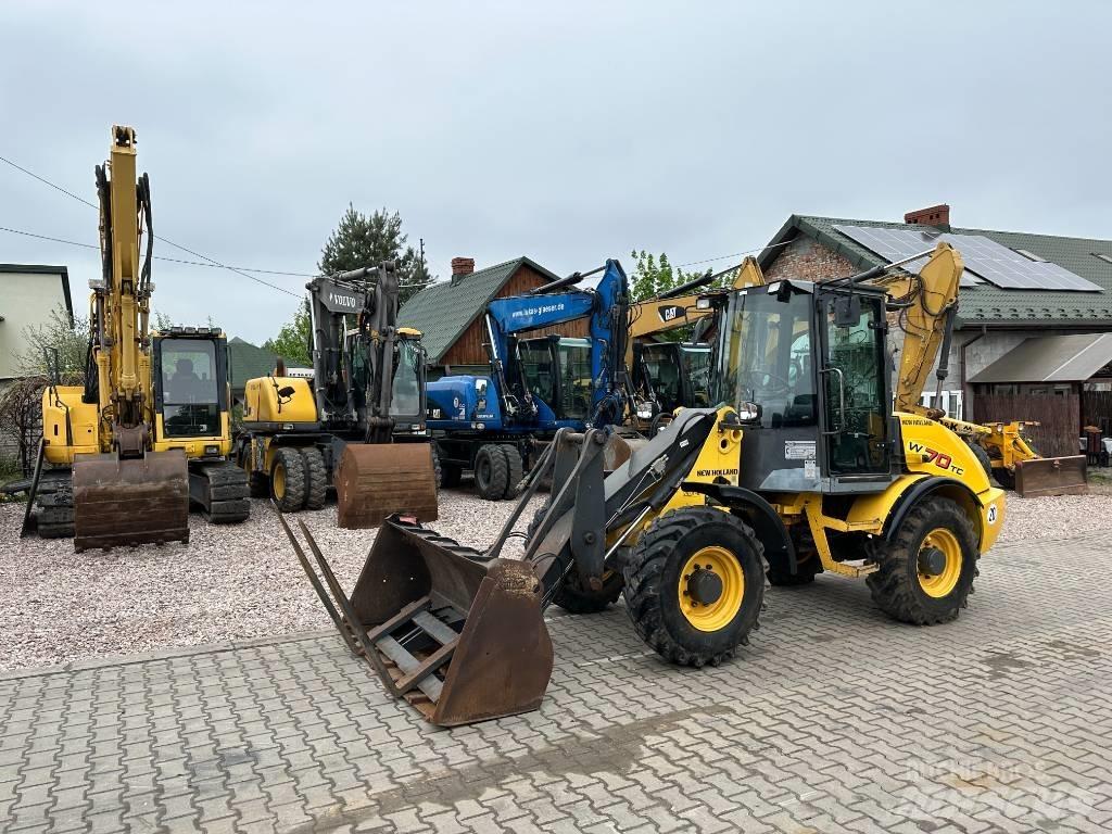 New Holland W 70 TC لوادر بعجل