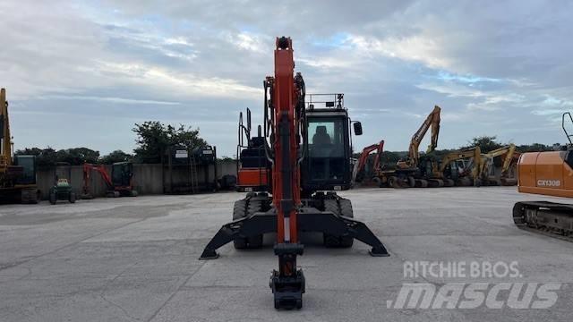 Doosan DX140W-5 حفارات بعجل