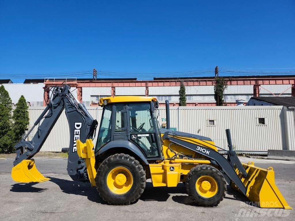 CAT 906M لوادر بعجل