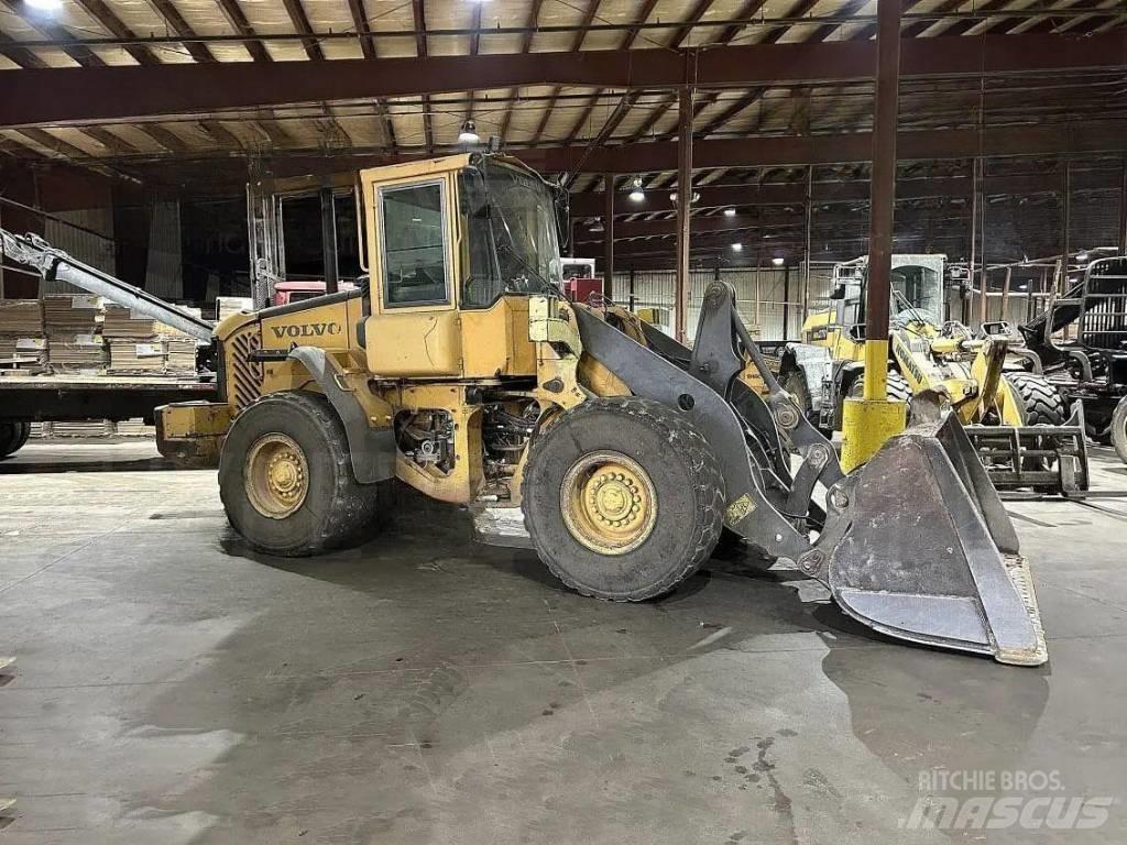 Volvo L 90 E لوادر بعجل