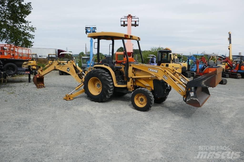 DEERE 110 لوادر ذات جرافات عكسية
