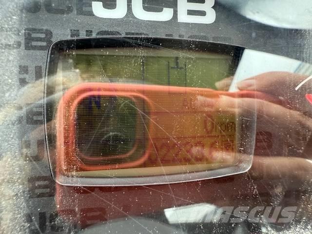 JCB 409 لوادر بعجل