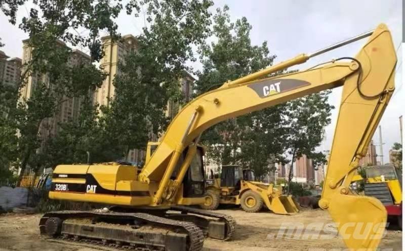 CAT 320 B حفارات زحافة