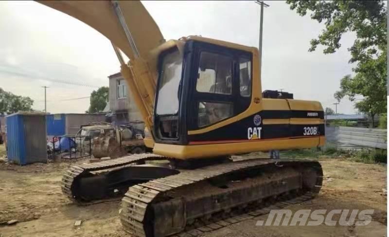 CAT 320 B حفارات زحافة