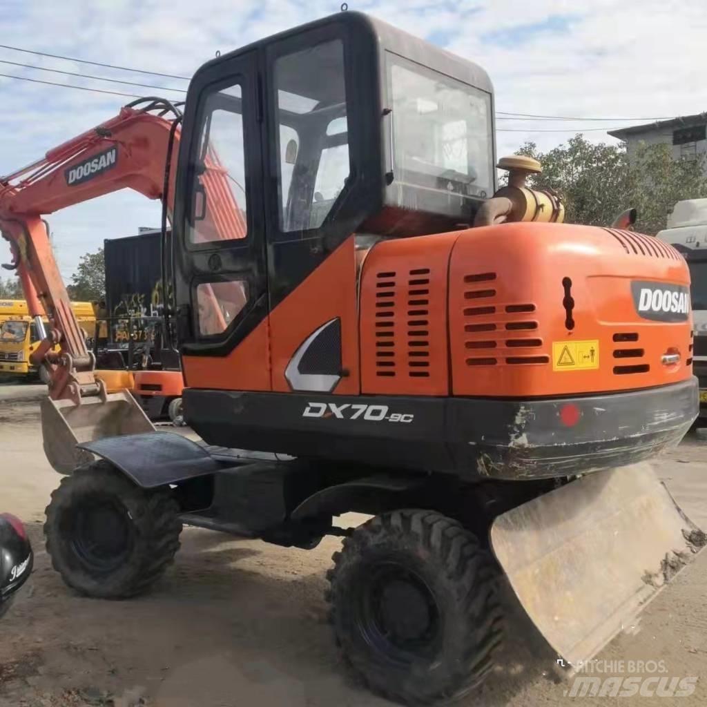 Doosan DX70W-9C حفارات بعجل