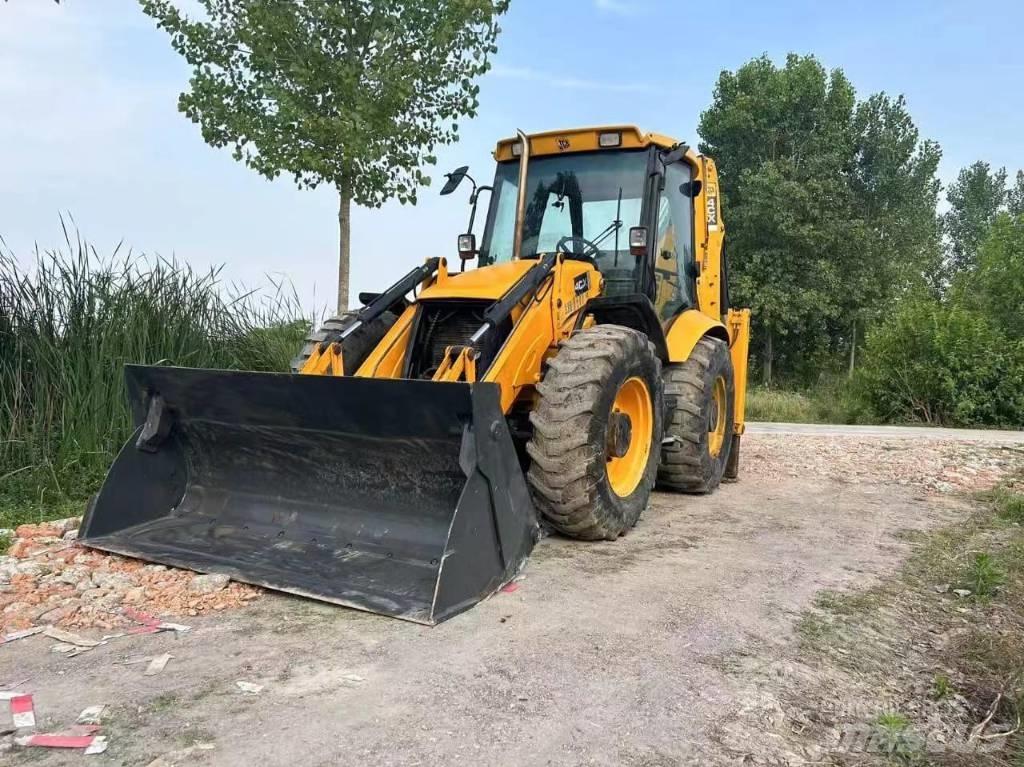 JCB 4 CX لوادر ذات جرافات عكسية