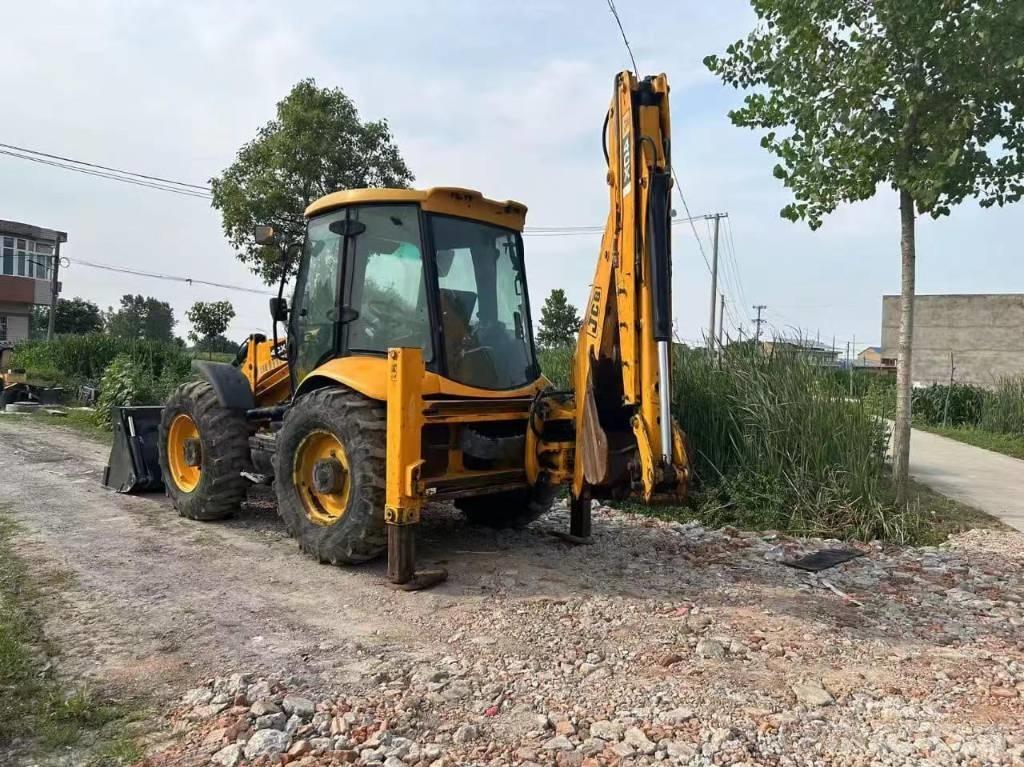 JCB 4 CX لوادر ذات جرافات عكسية