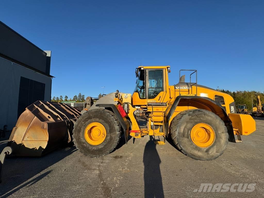 Volvo l 250 H لوادر بعجل
