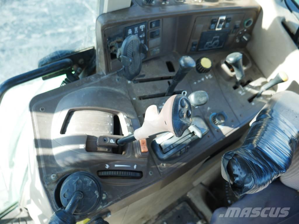 John Deere 6520 الجرارات