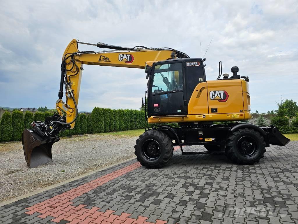 CAT M 315 F حفارات بعجل
