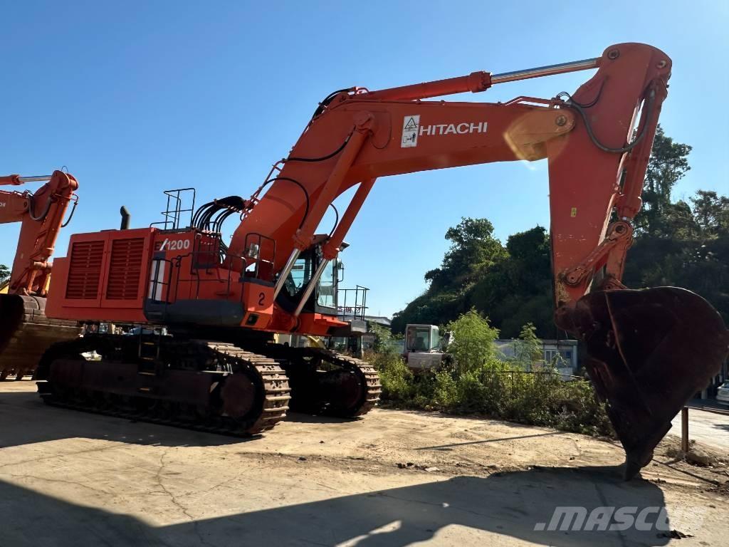 Hitachi EX 1200 حفارات زحافة