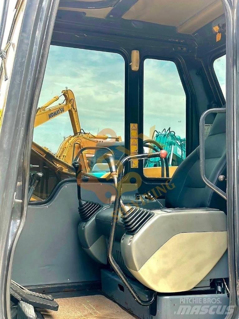 Komatsu PC 60 حفارات زحافة