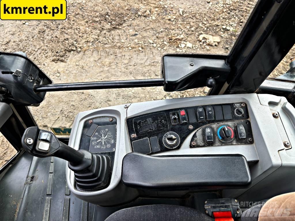 CAT 906 M لوادر بعجل