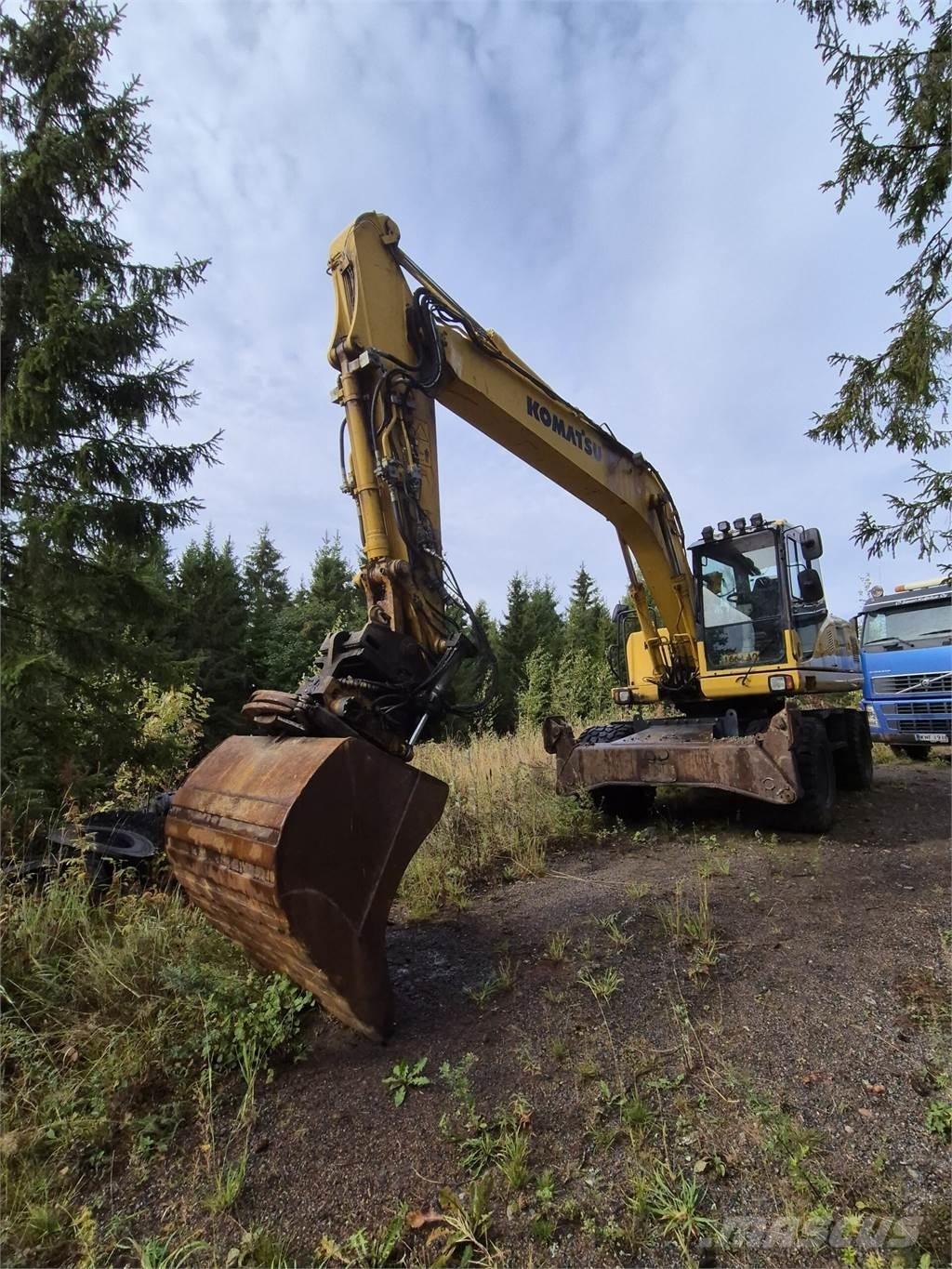 Komatsu PW180 ES-7 حفارات بعجل
