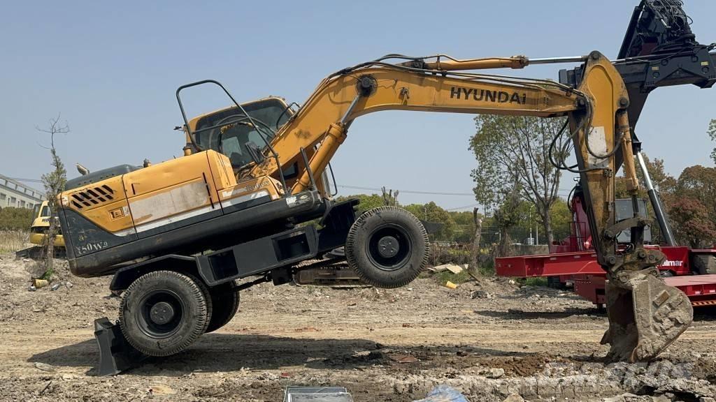Hyundai R 150 W-9 حفارات بعجل