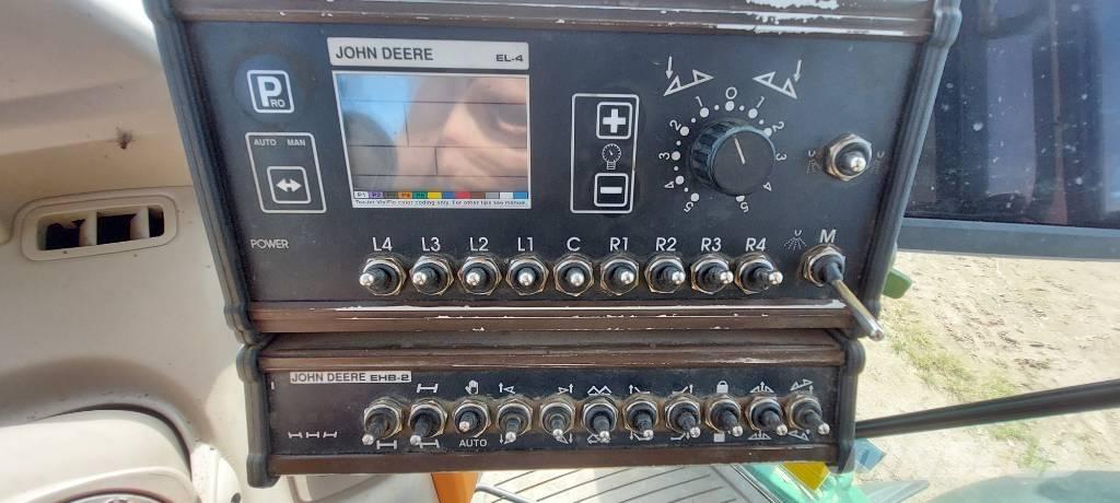 John Deere 840 i الرشاشات