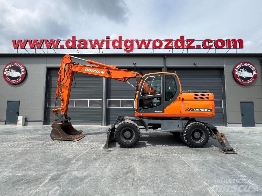 Doosan DX 160 W حفارات بعجل