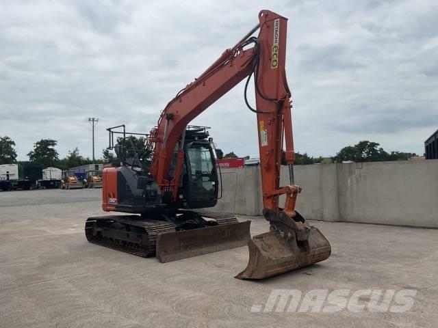 Hitachi ZX 135 US-6 حفارات زحافة