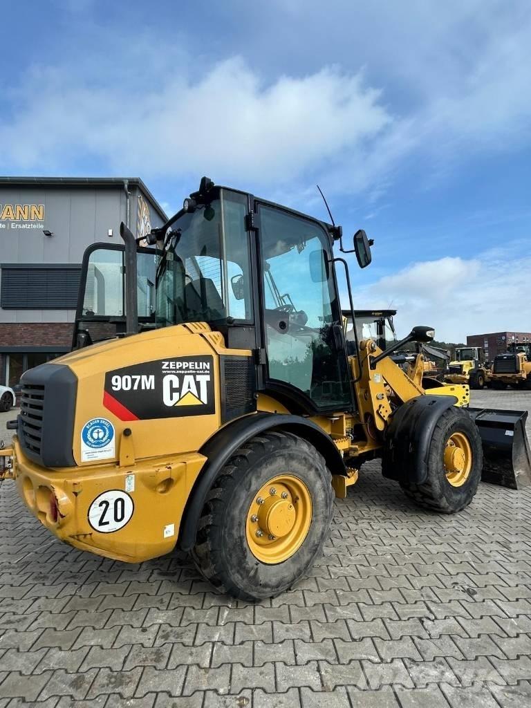 CAT 907 M لوادر بعجل