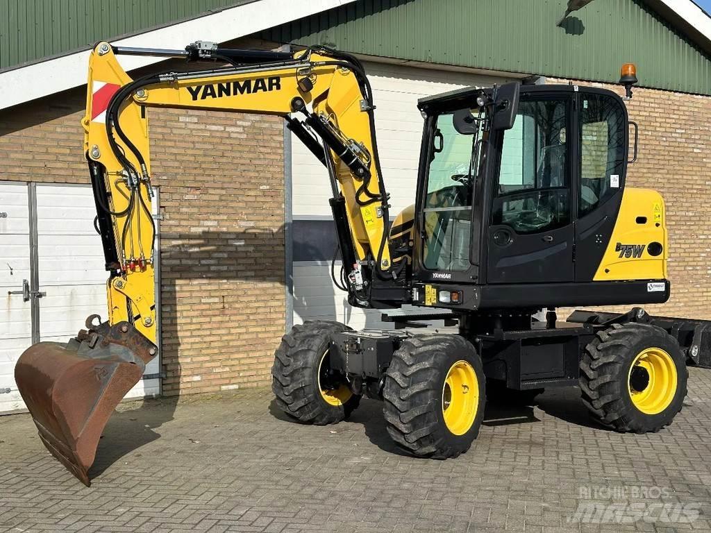 Yanmar B75W حفارات بعجل