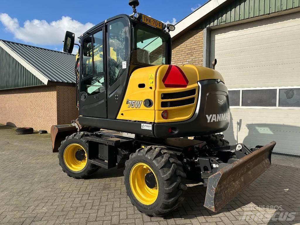 Yanmar B75W حفارات بعجل