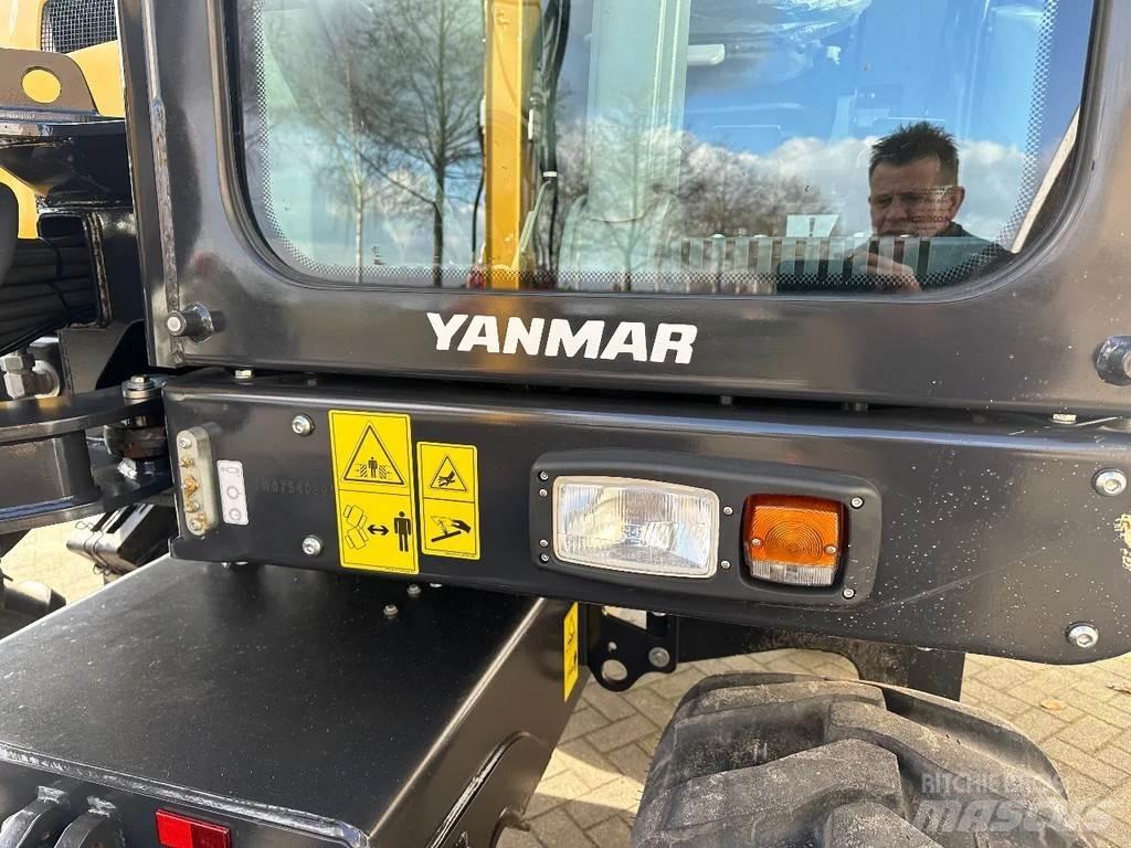 Yanmar B75W حفارات بعجل