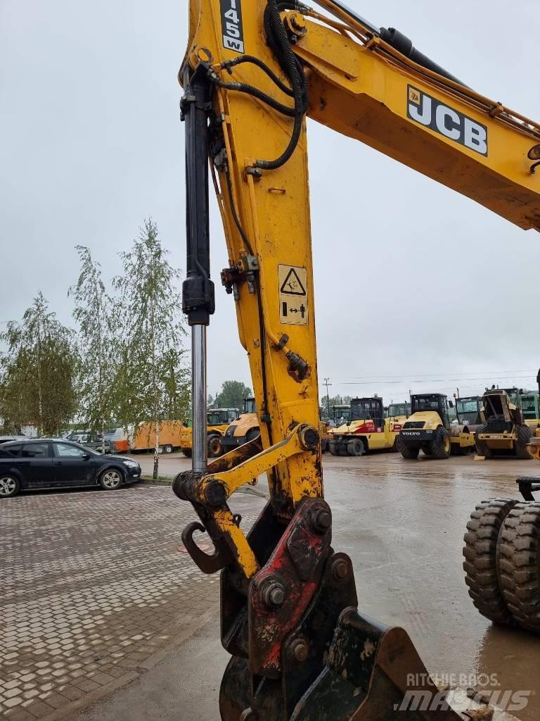 JCB JS 145 W حفارات بعجل