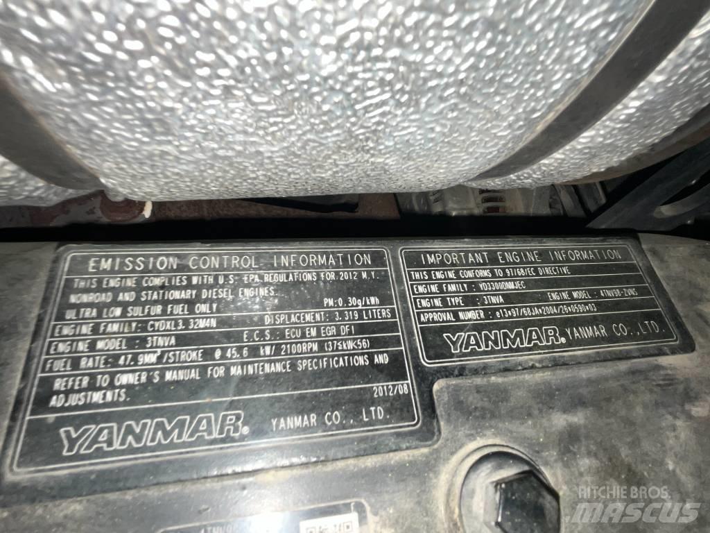 Neuson 6503 WD حفارات بعجل