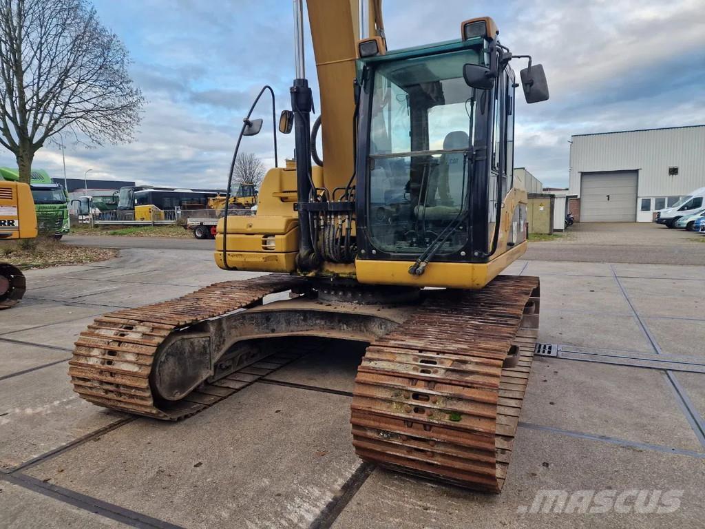 CAT 323d حفارات زحافة