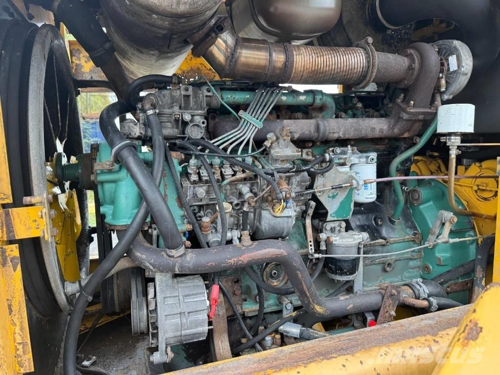 Volvo L 90 لوادر بعجل