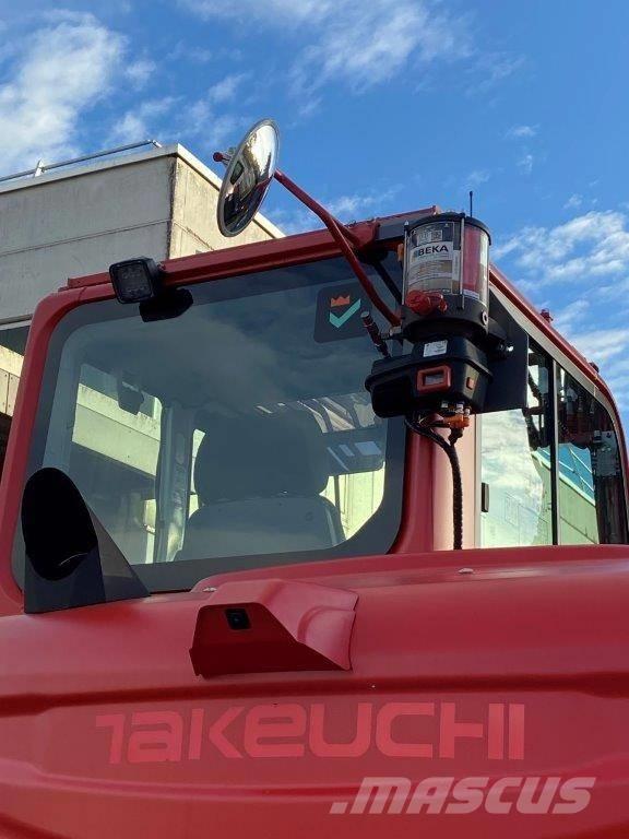 Takeuchi TB 395 W حفارات بعجل
