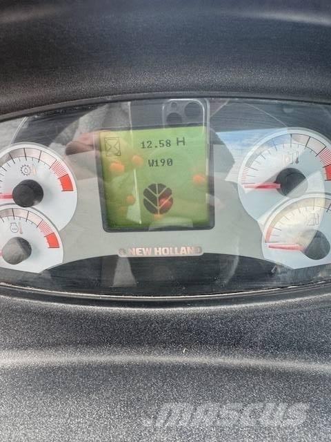 New Holland W 110 B لوادر بعجل