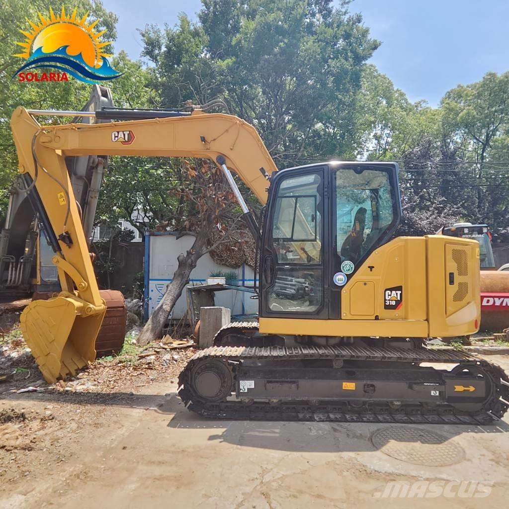 CAT 310 حفارات زحافة