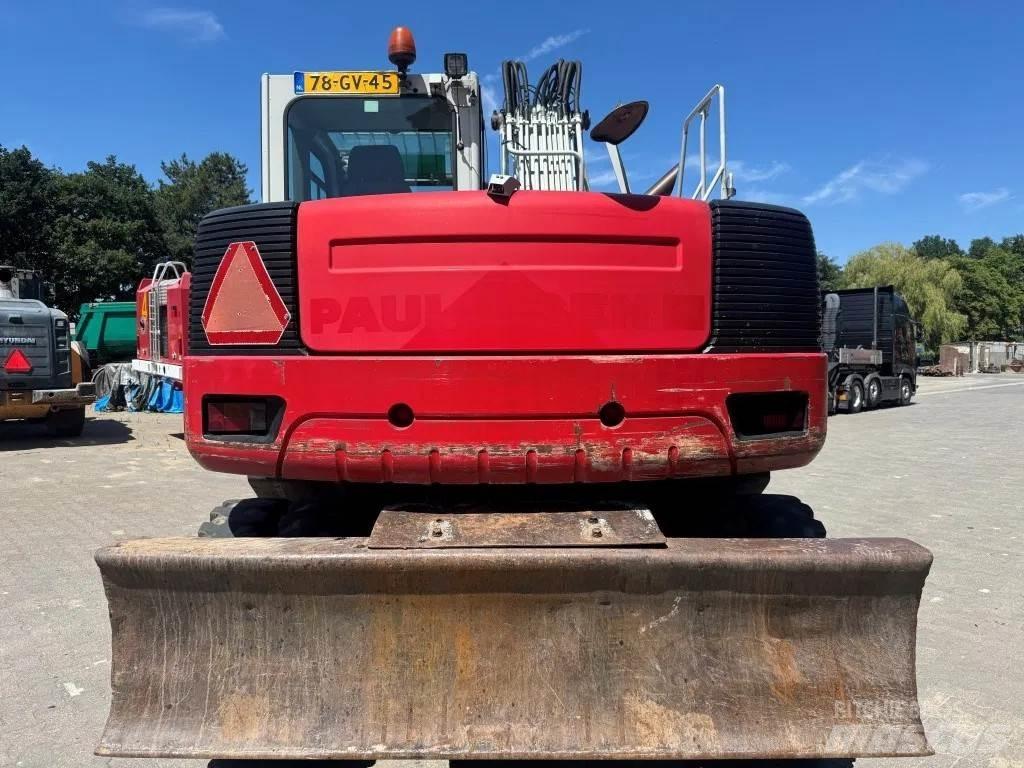 Takeuchi TB1160W حفارات بعجل