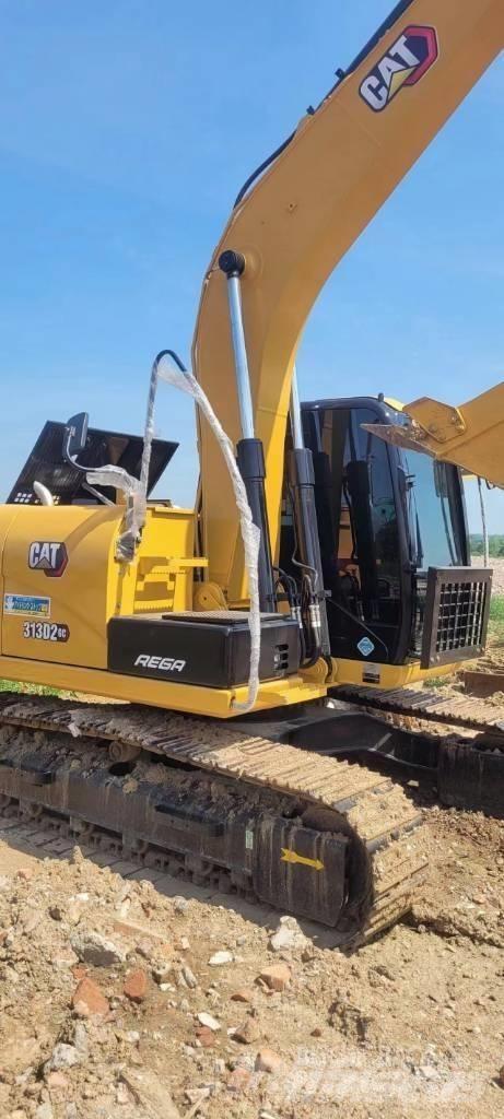 CAT 313 حفارات وسط 7 طن - 12 طن