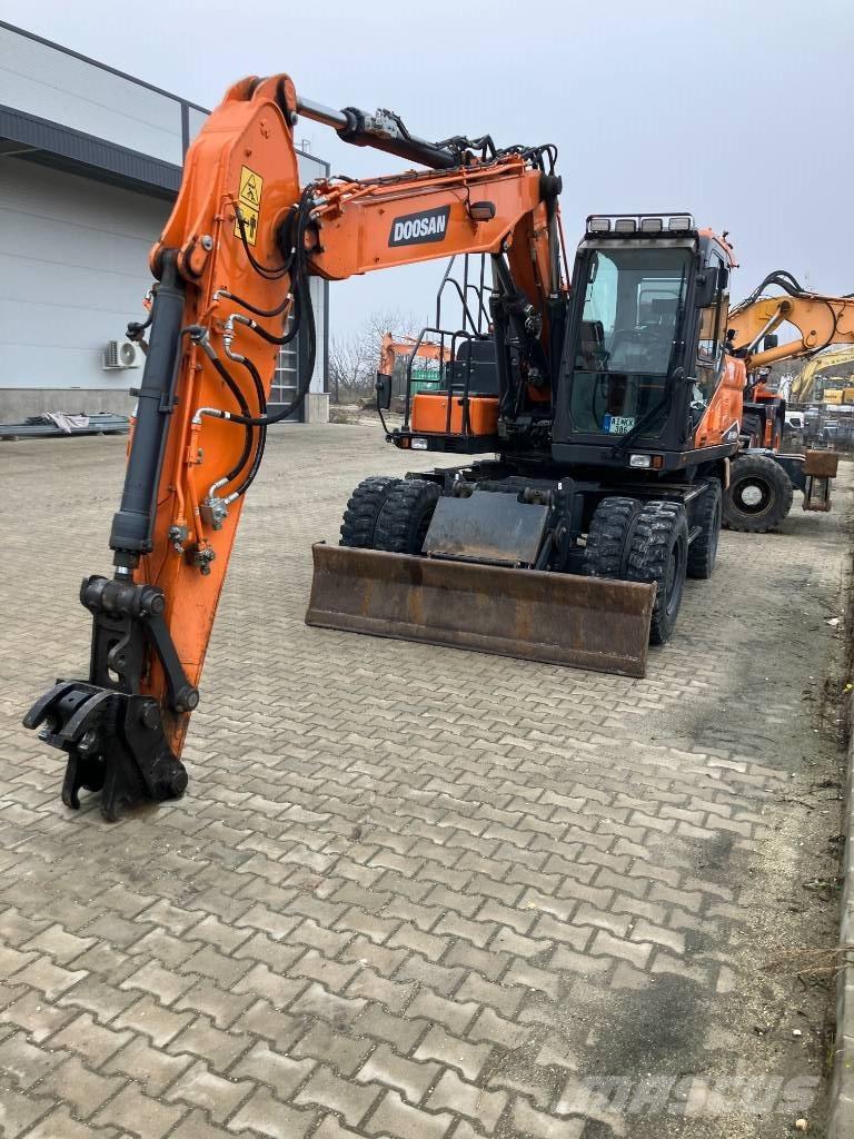 Doosan DX140W-7 حفارات بعجل
